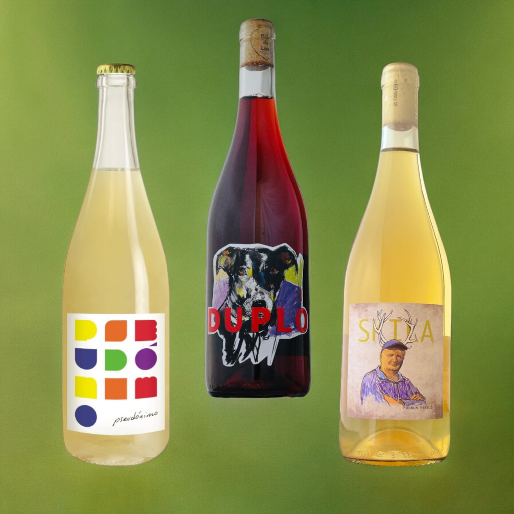 A photo of three different natural wines representing our 'Exploring Natural Wine" Subscription. Not actual wines included in subscription, wines vary month to month.